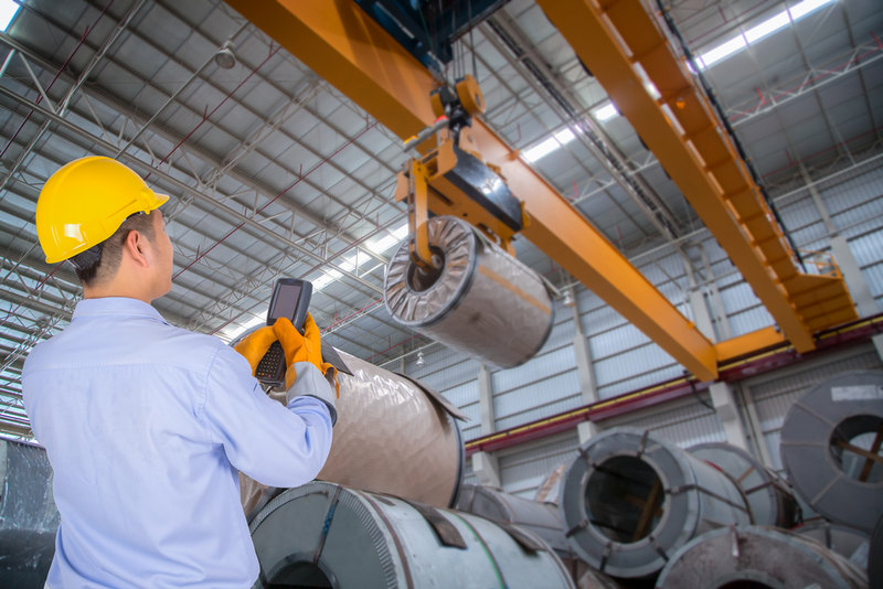 In which industries are material handling systems essential?